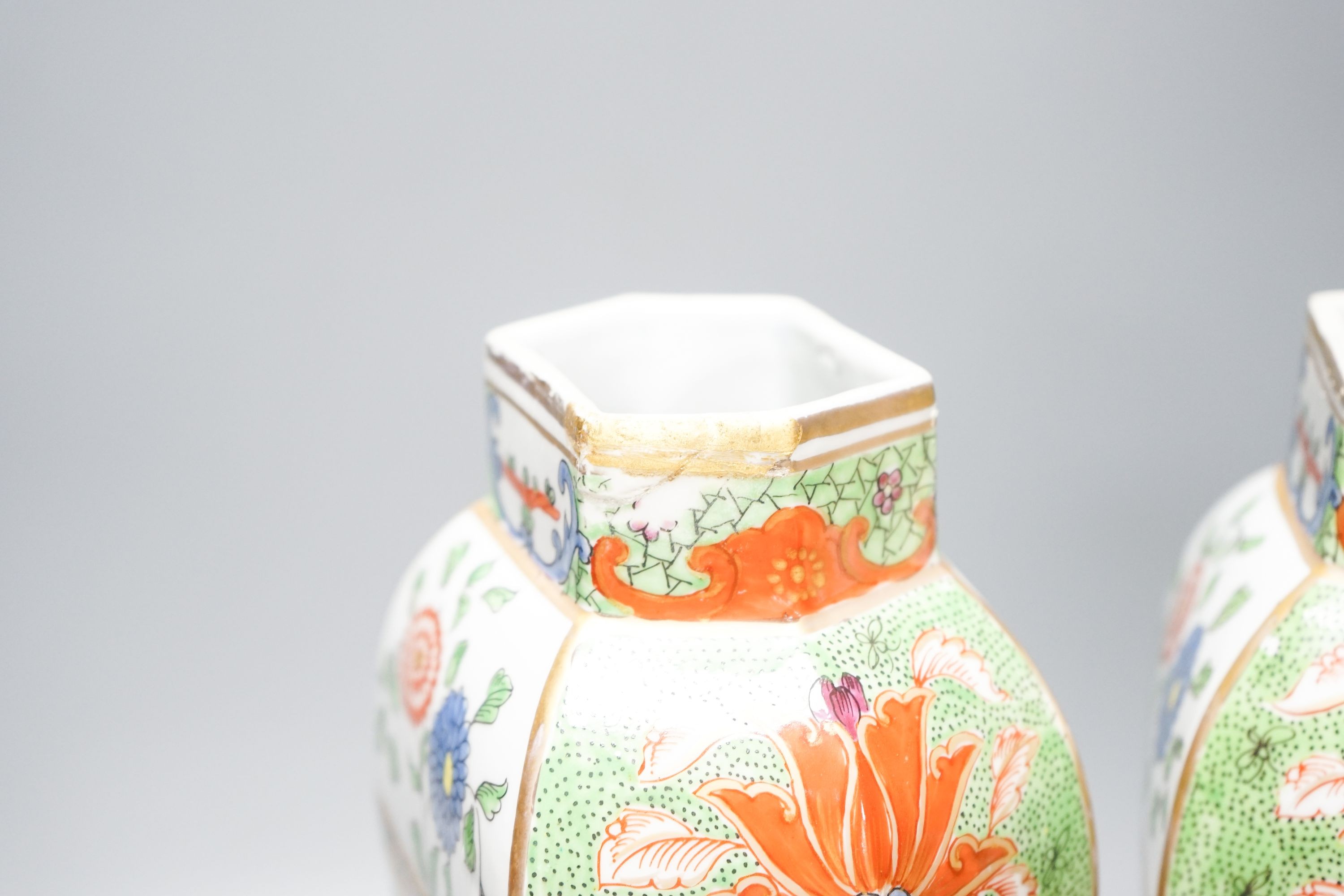 A pair of Samson kakiemon style lidded hexagonal baluster vases 41cm